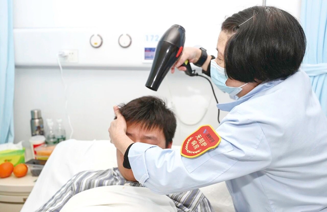 ����ԱΪ����ϴͷ������